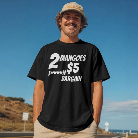 Man wearing a black t-shirt with text standing outdoors against a blue sky.